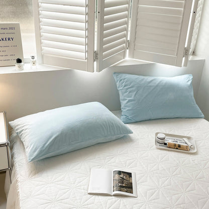 Soft flannel fleece pillowcase in a cozy minimalist bedroom setting – RoomDen