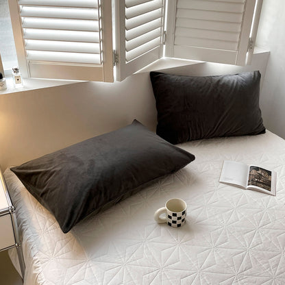 Soft flannel fleece pillowcase in a cozy minimalist bedroom setting – RoomDen