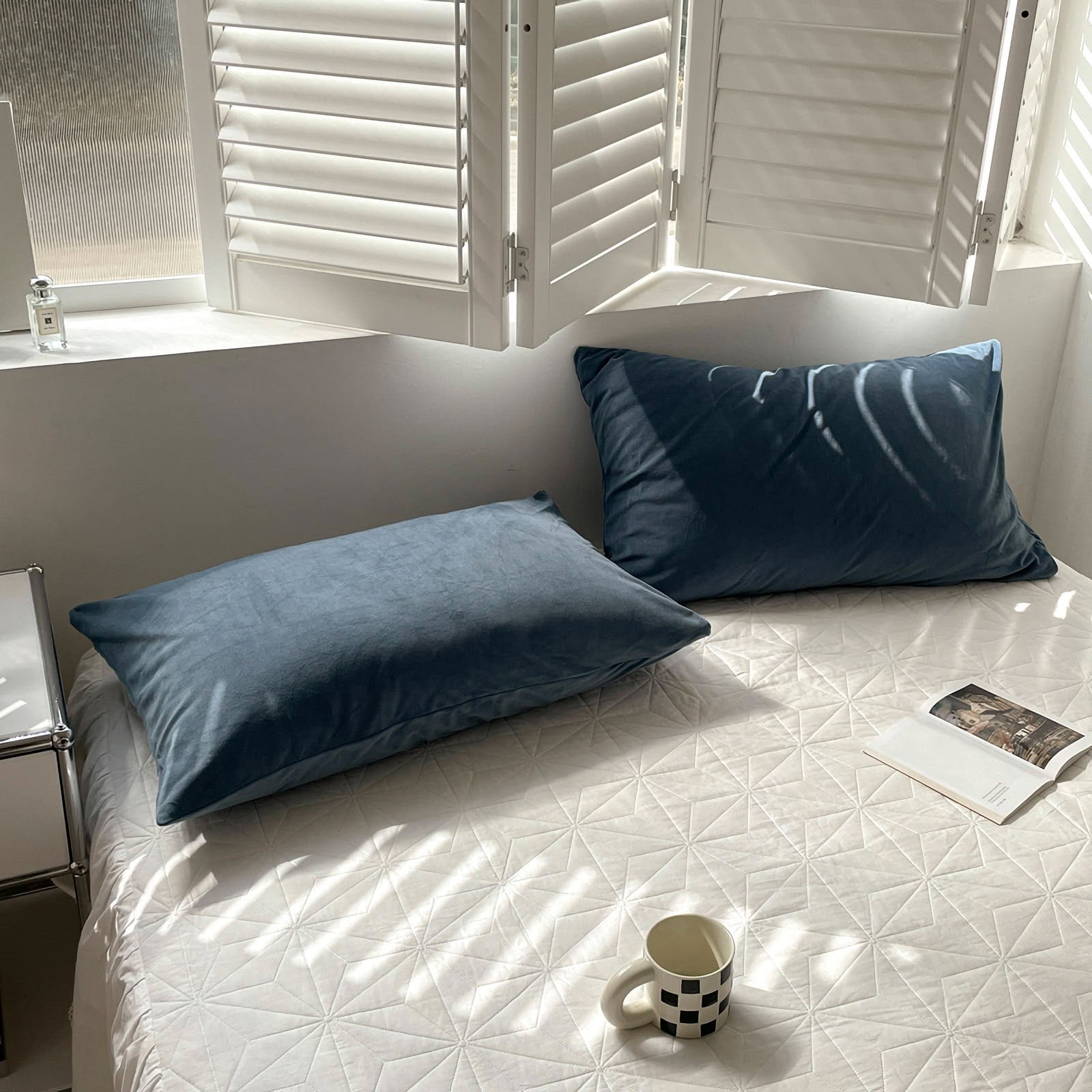 Soft flannel fleece pillowcase in a cozy minimalist bedroom setting – RoomDen