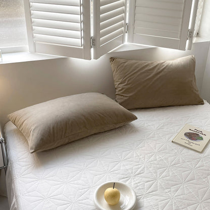 Soft flannel fleece pillowcase in a cozy minimalist bedroom setting – RoomDen