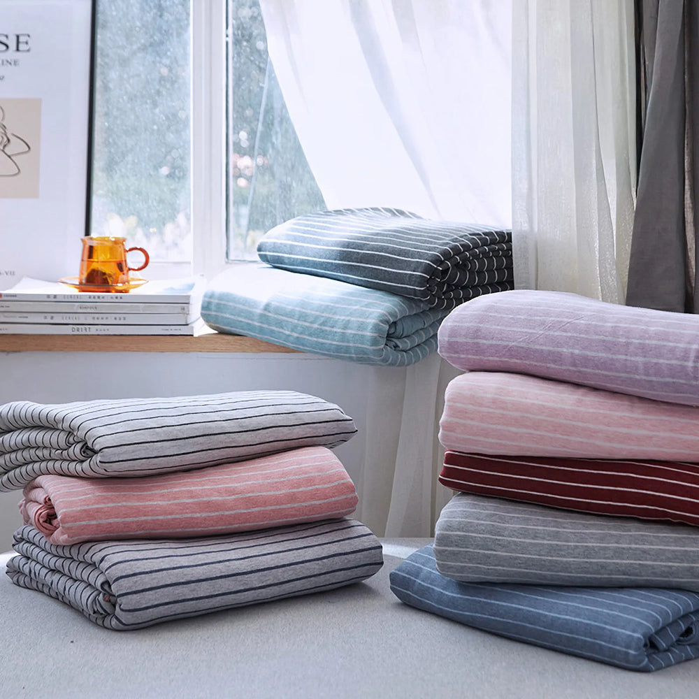 Striped washed cotton duvet cover set folded view – RoomDen