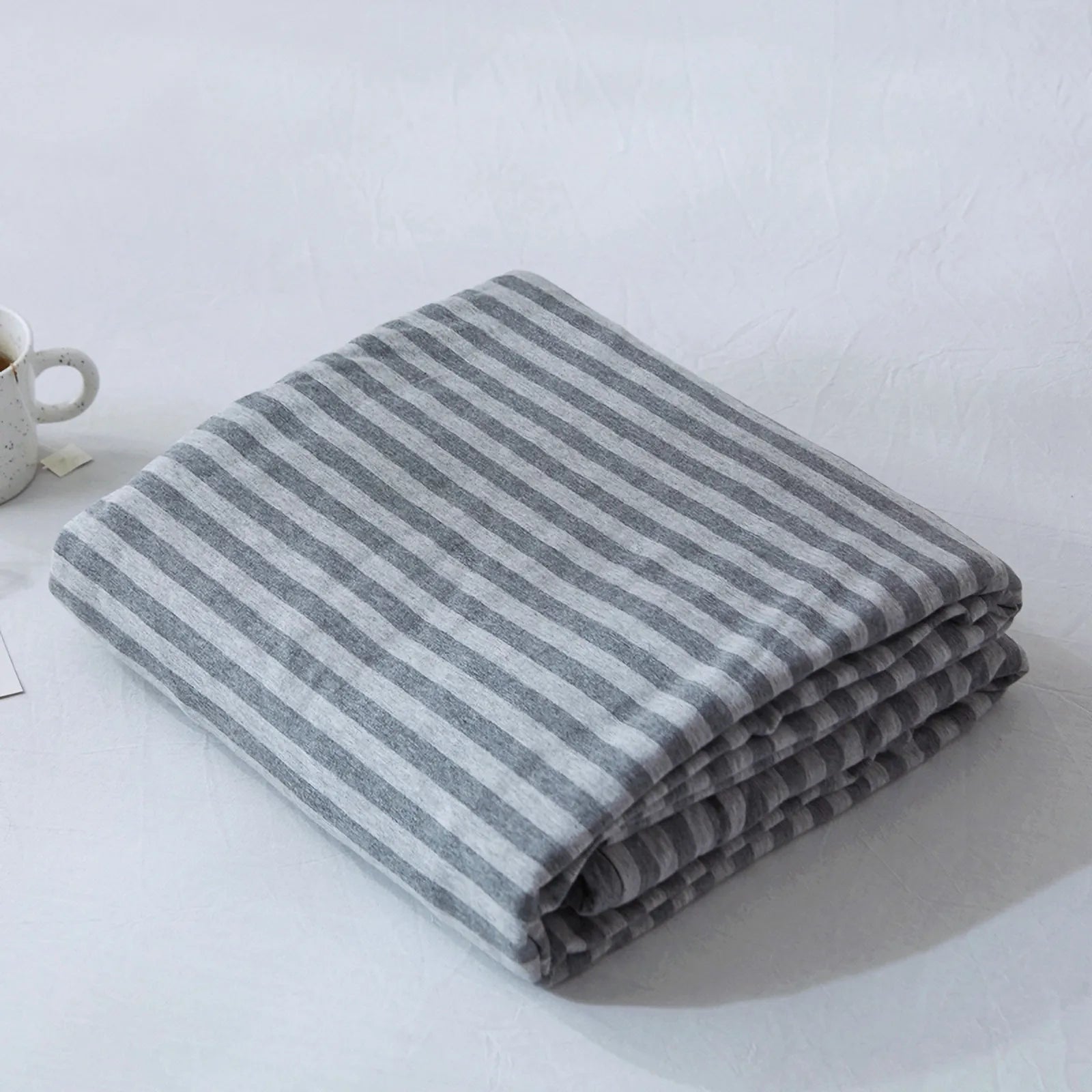 Striped washed cotton duvet cover set folded view – RoomDen