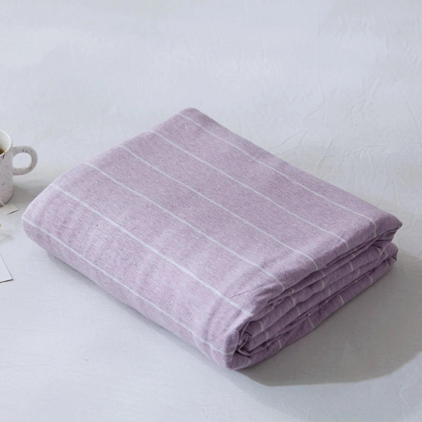 Striped washed cotton duvet cover set folded view – RoomDen