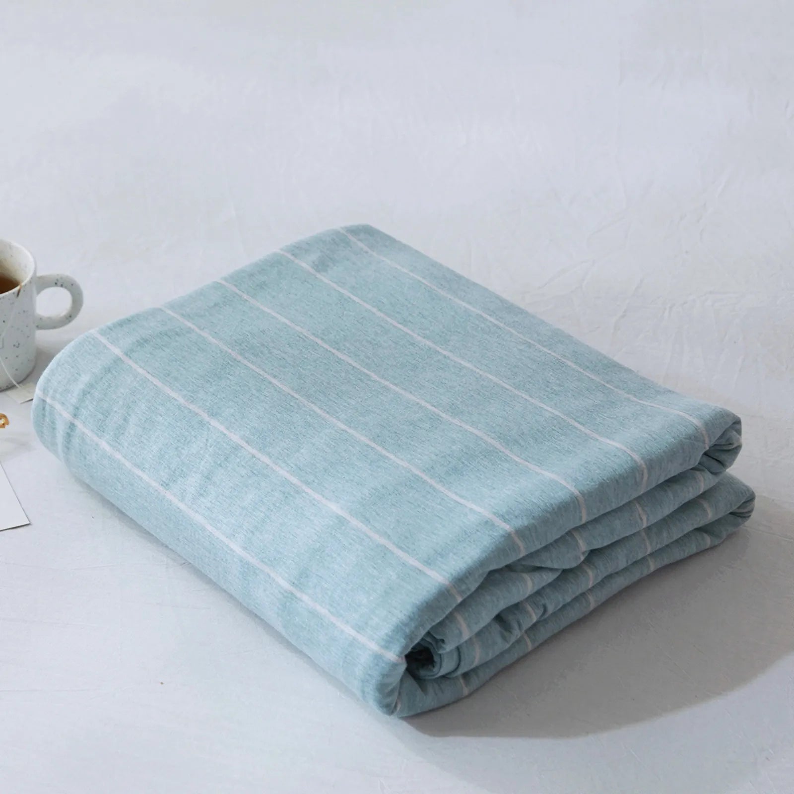Striped washed cotton duvet cover set folded view – RoomDen