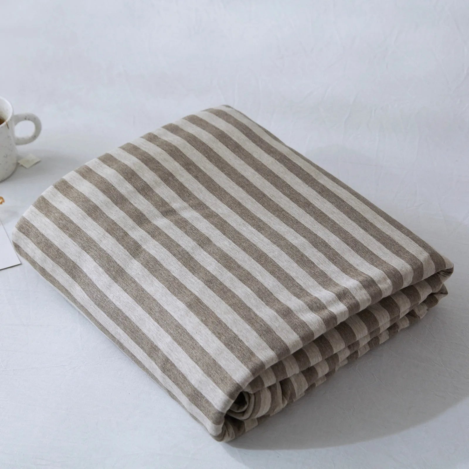 Striped washed cotton duvet cover set folded view – RoomDen