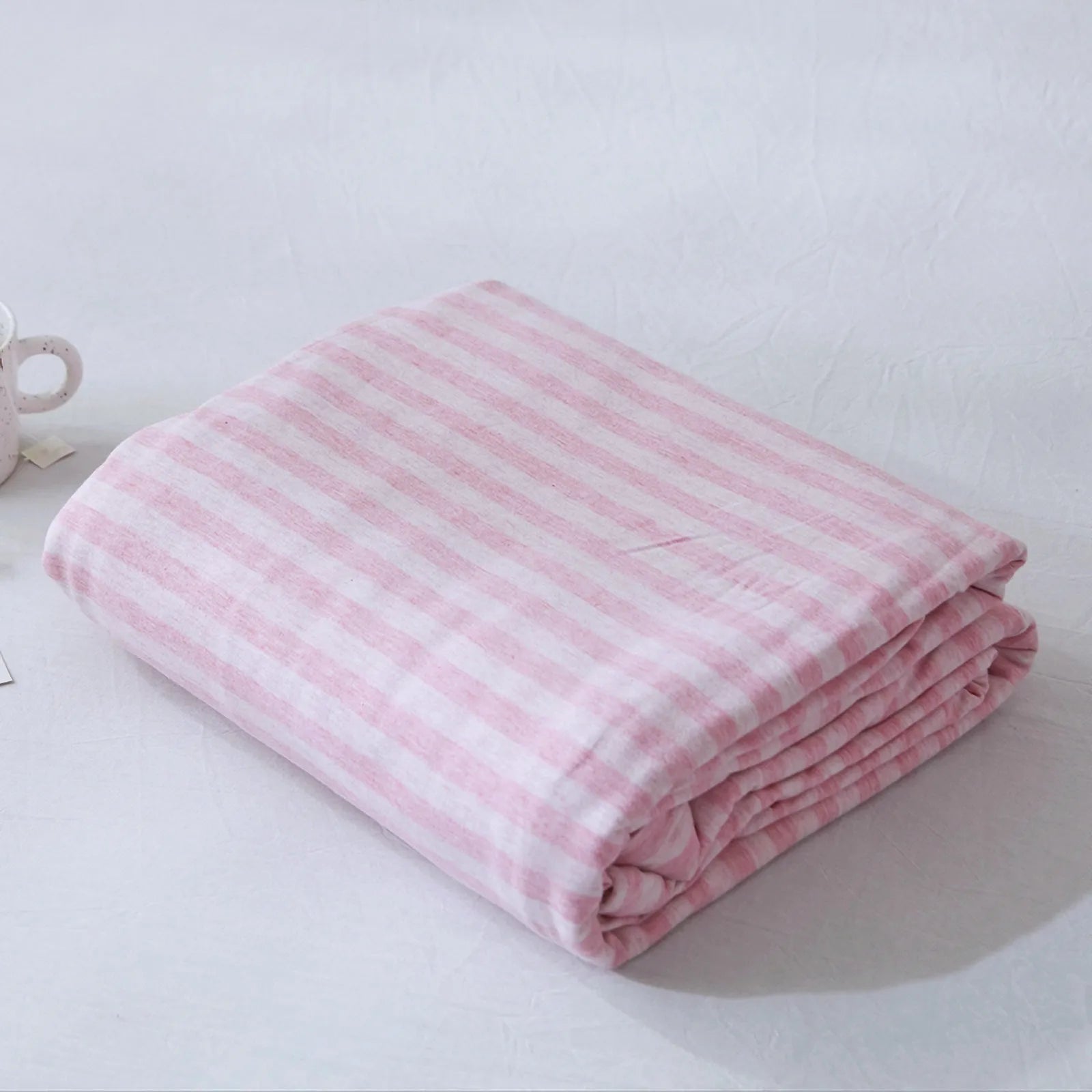Striped washed cotton duvet cover set folded view – RoomDen