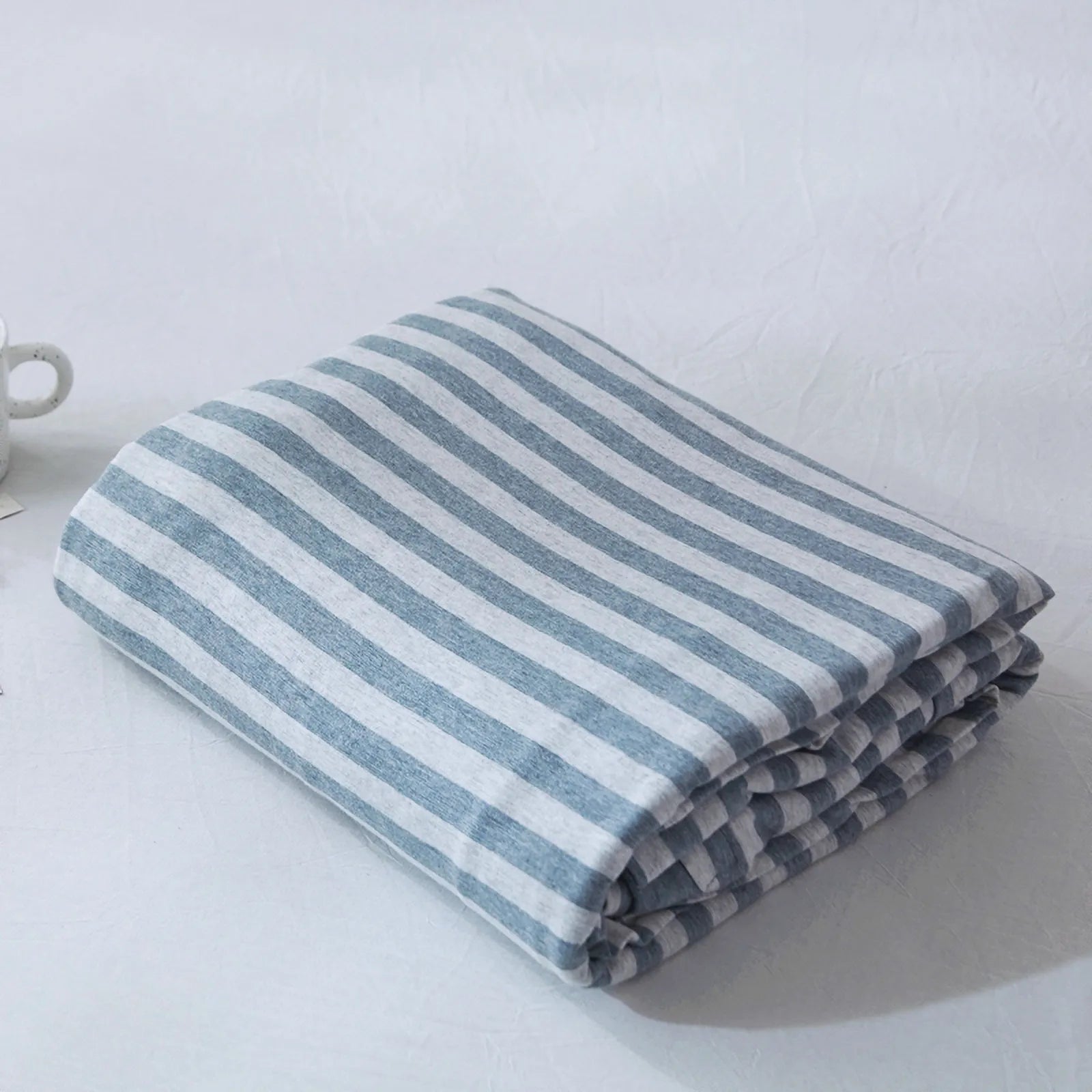 Striped washed cotton duvet cover set folded view – RoomDen