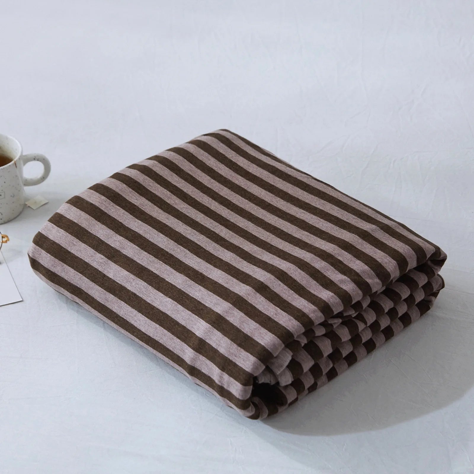 Striped washed cotton duvet cover set folded view – RoomDen