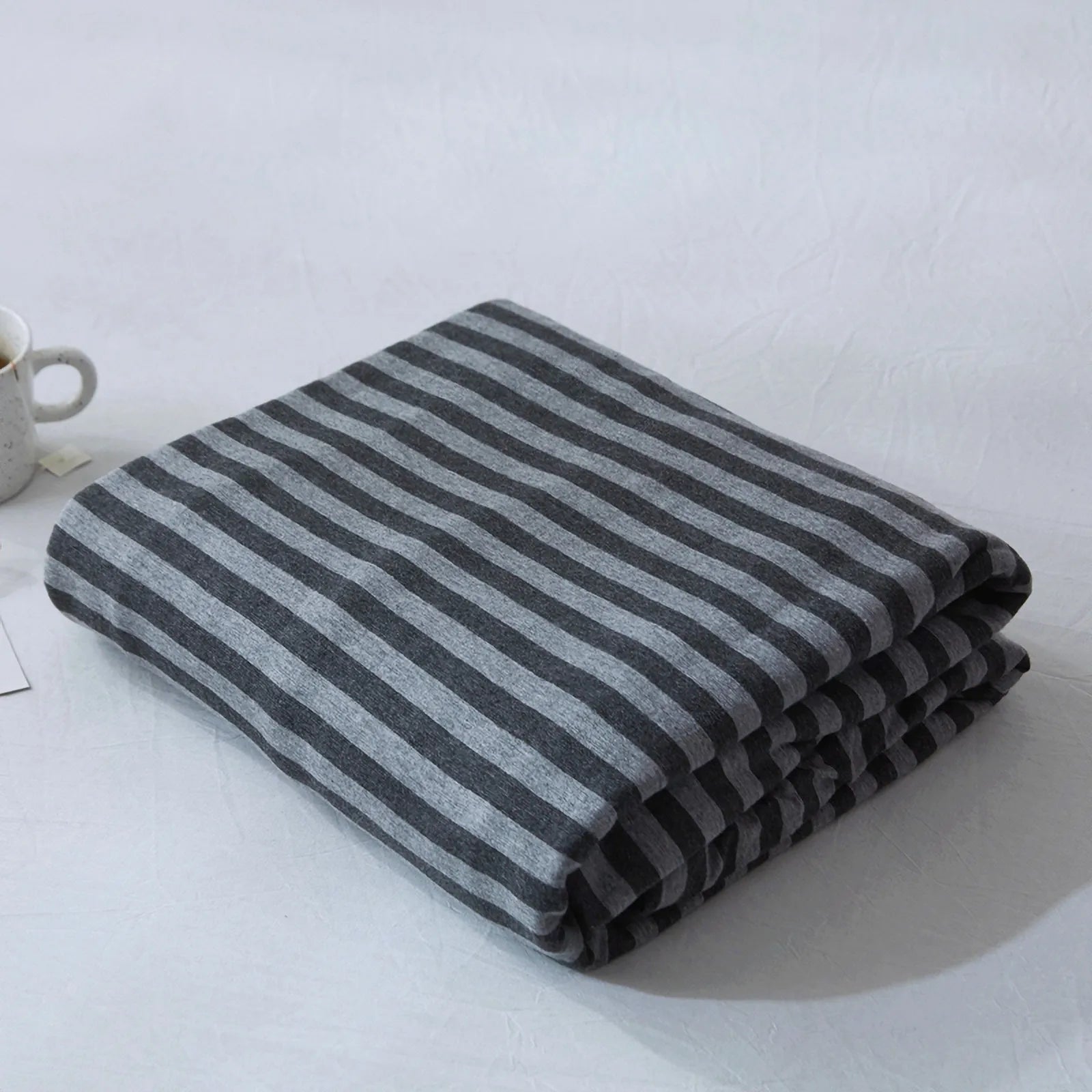 Striped washed cotton duvet cover set folded view – RoomDen