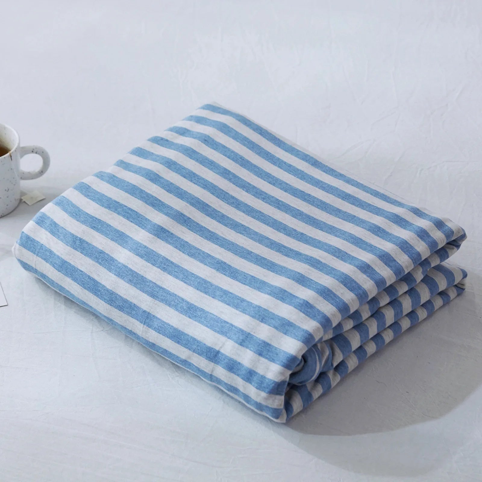 Striped washed cotton duvet cover set folded view – RoomDen