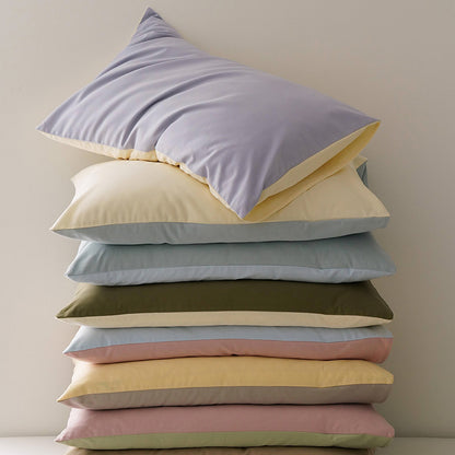 Minimalist two-tone washed cotton pillowcase in soft solid colors – RoomDen