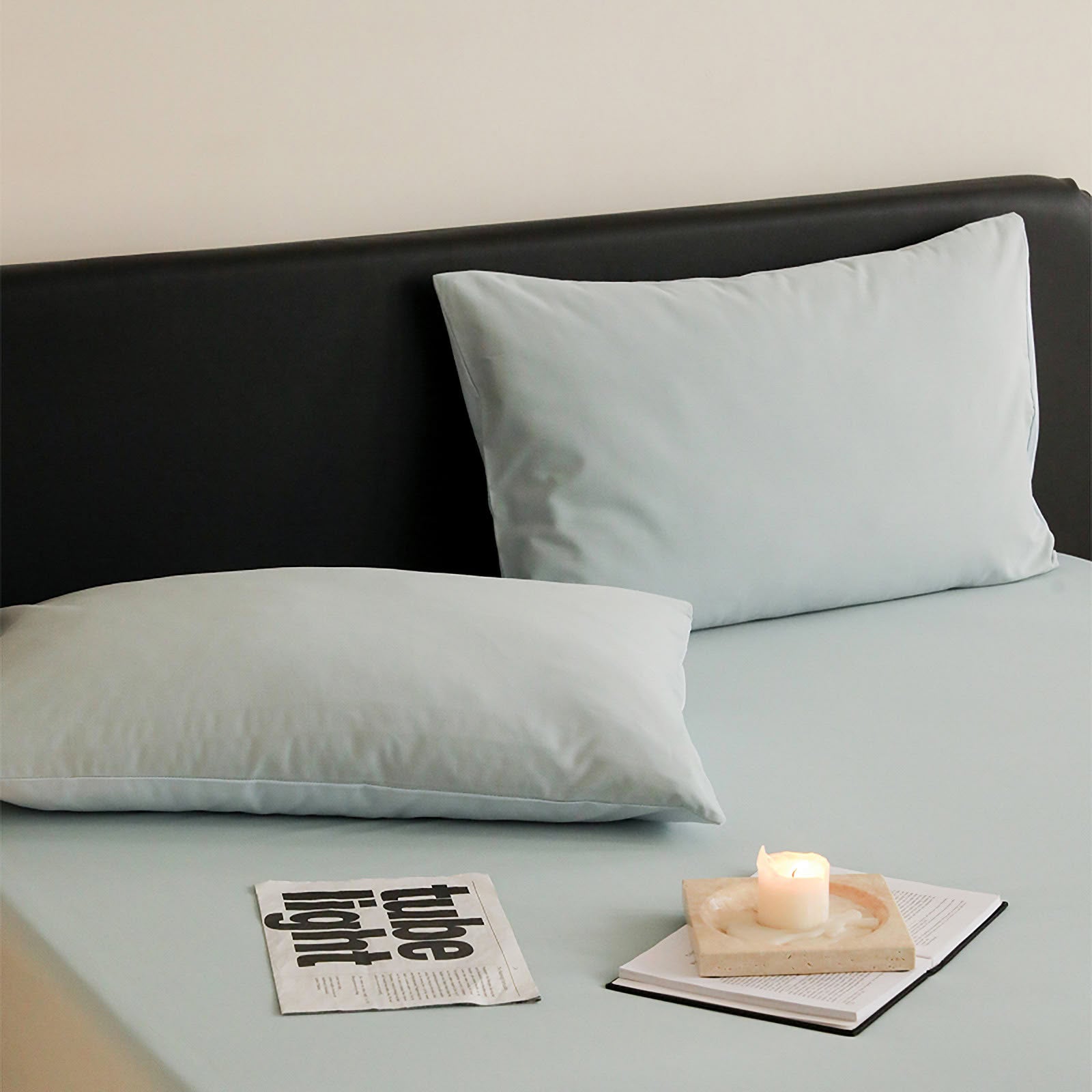 Minimalist two-tone washed cotton pillowcase in soft solid colors – RoomDen