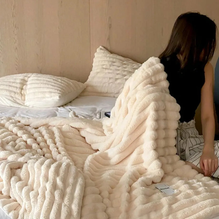 Ripple textured plush faux fur throw blanket in a cozy bedroom setting – RoomDen