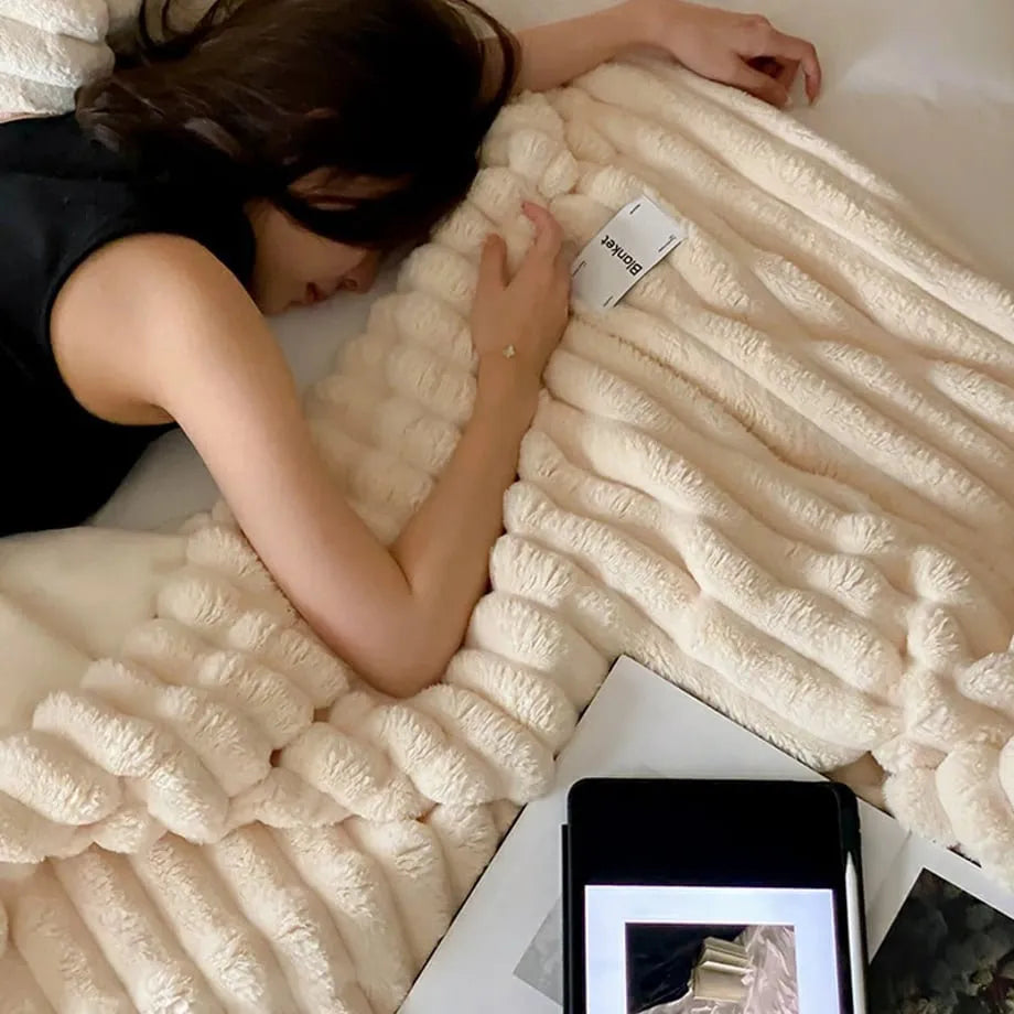Ripple textured plush faux fur throw blanket in a cozy bedroom setting – RoomDen