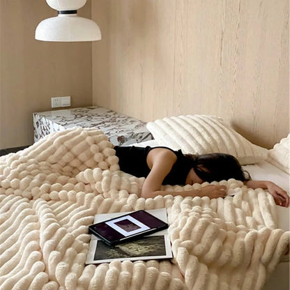 Ripple textured plush faux fur throw blanket in a cozy bedroom setting – RoomDen