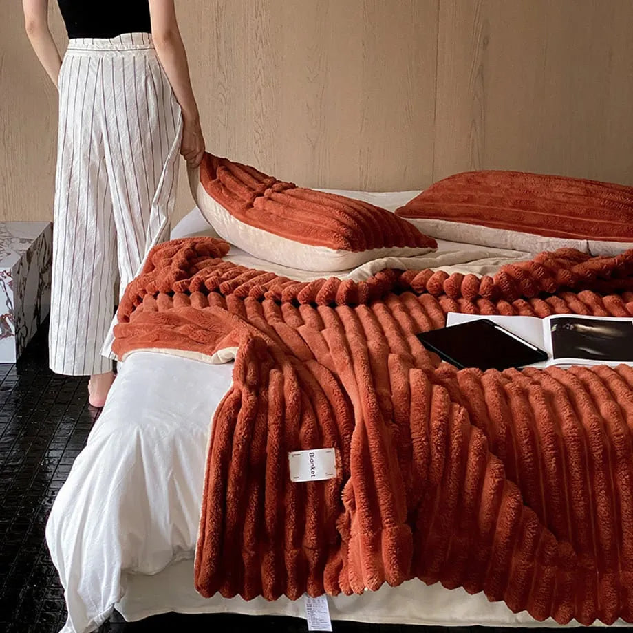 Ripple textured plush faux fur throw blanket in a cozy bedroom setting – RoomDen