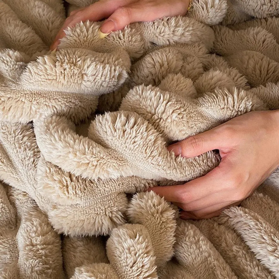 Ripple textured plush faux fur throw blanket in a cozy bedroom setting – RoomDen