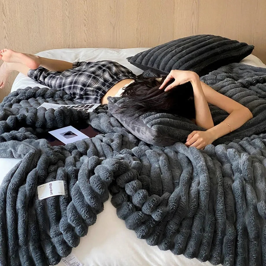 Ripple textured plush faux fur throw blanket in a cozy bedroom setting – RoomDen