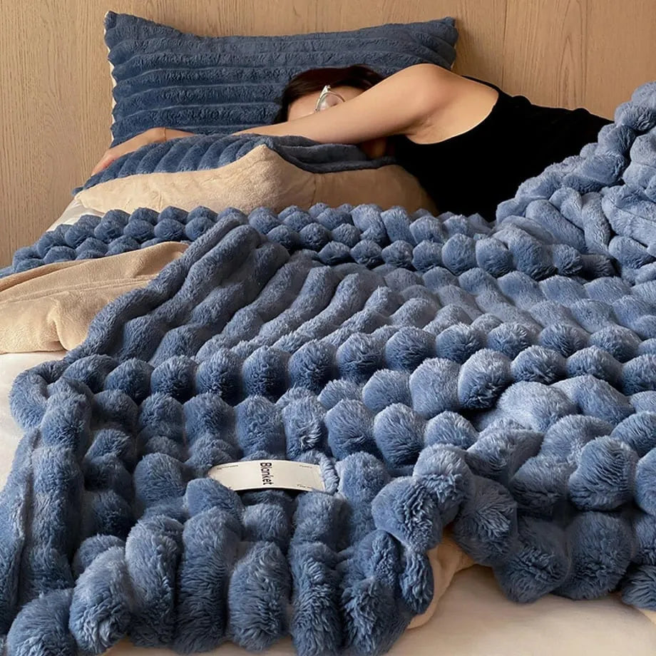 Ripple textured plush faux fur throw blanket in a cozy bedroom setting – RoomDen