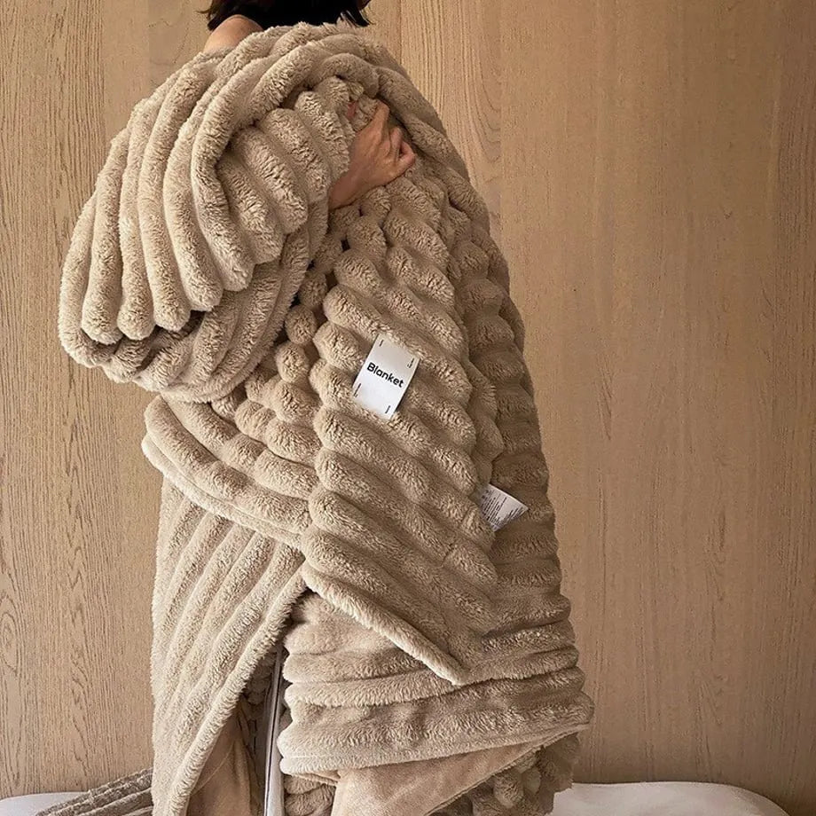 Ripple textured plush faux fur throw blanket in a cozy bedroom setting – RoomDen