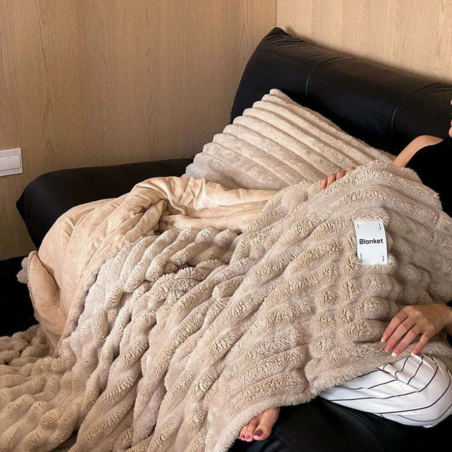 Ripple textured plush faux fur throw blanket in a cozy bedroom setting – RoomDen