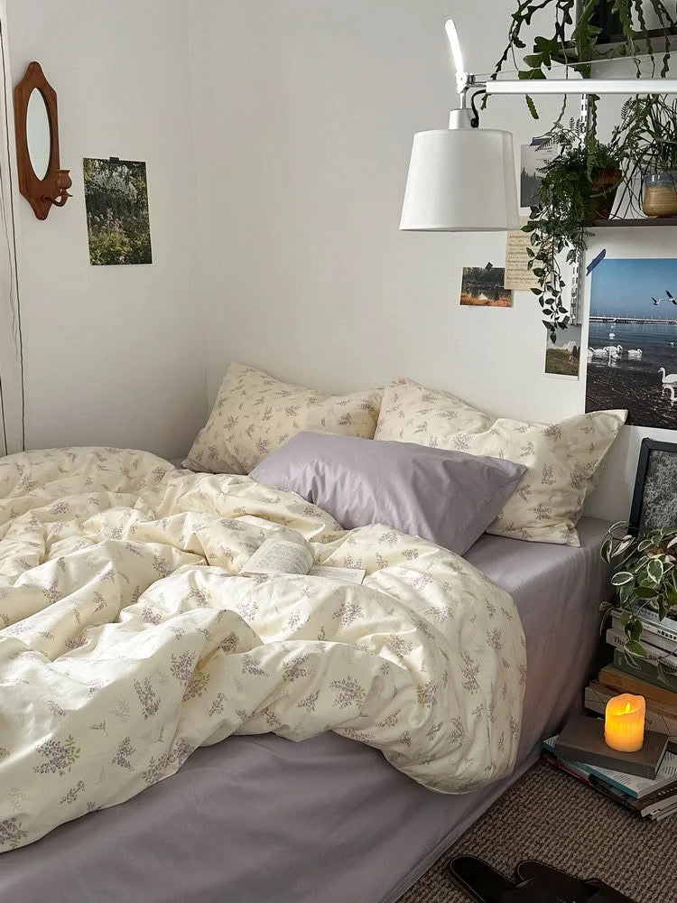 Full bed view of the wisteria floral bedding set in a bright room, highlighting the Cottagecore aesthetic - RoomDen.