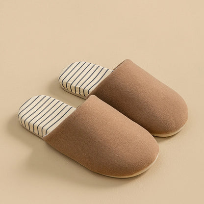 Side profile of brown cotton house slipper showcasing warm jersey texture