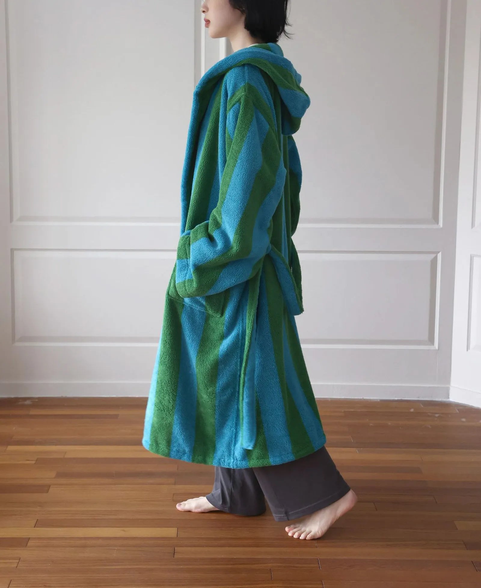 Side profile of the long-staple cotton robe showing the relaxed fit and drape - RoomDen