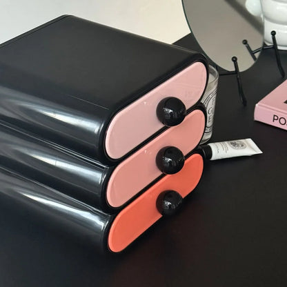 Close-up of the glossy finish and color block drawers on the Y2K-style desk organizer. - RoomDen