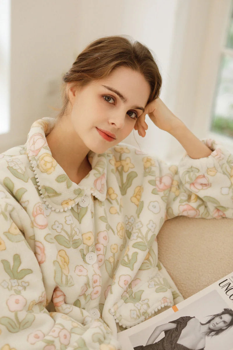 Model relaxing on sofa wearing fuzzy floral pajamas - RoomDen