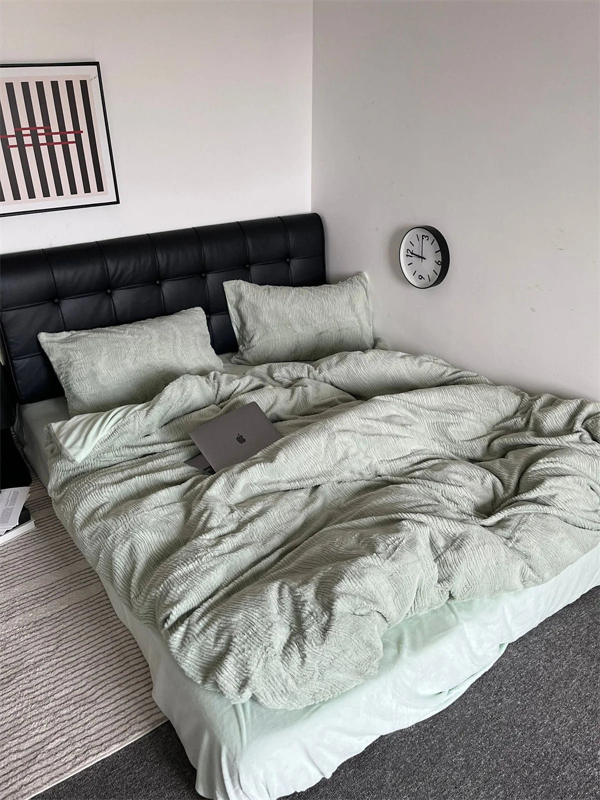 Full bed view of the Sage Green flannel fleece bedding set, styled in a modern, minimalist room. - RoomDen