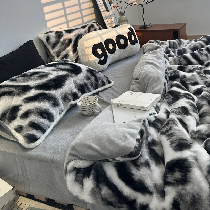 Black and white abstract print flannel fleece bedding with sunlight from blinds. - RoomDen