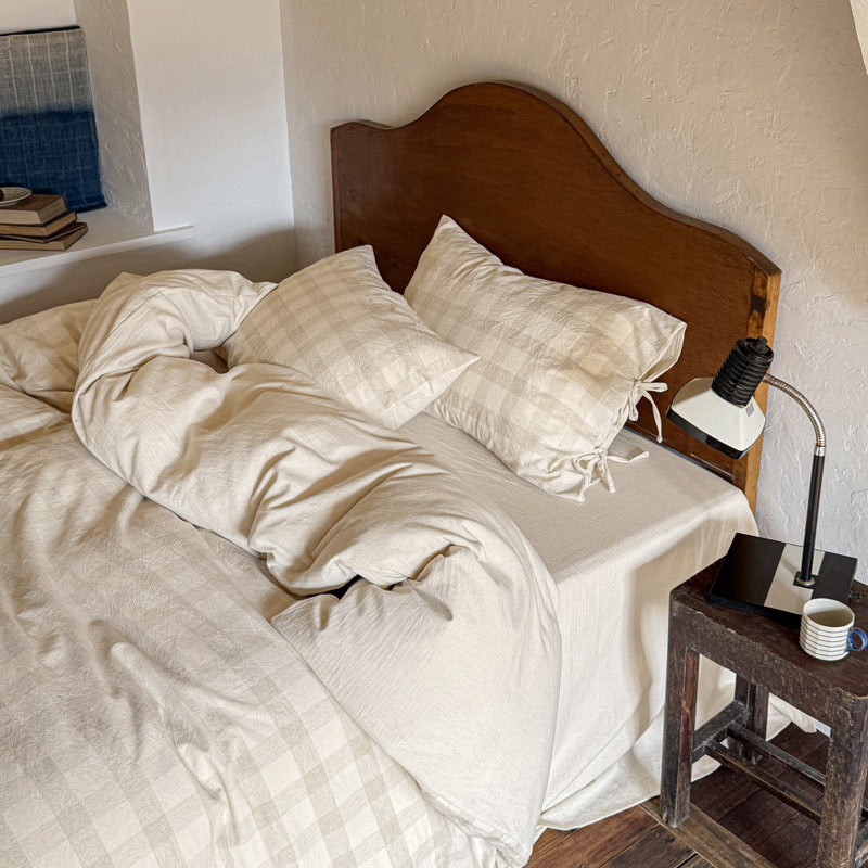 Ashfield Ivory Checkerboard Bedding Set – Checked pillows and duvet seen from the side - Roomden