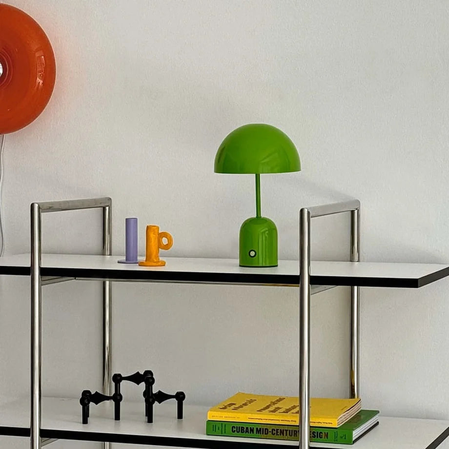 Side view of the Kelly Green cordless table lamp in a brightly lit room - RoomDen