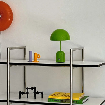 Side view of the Kelly Green cordless table lamp in a brightly lit room - RoomDen