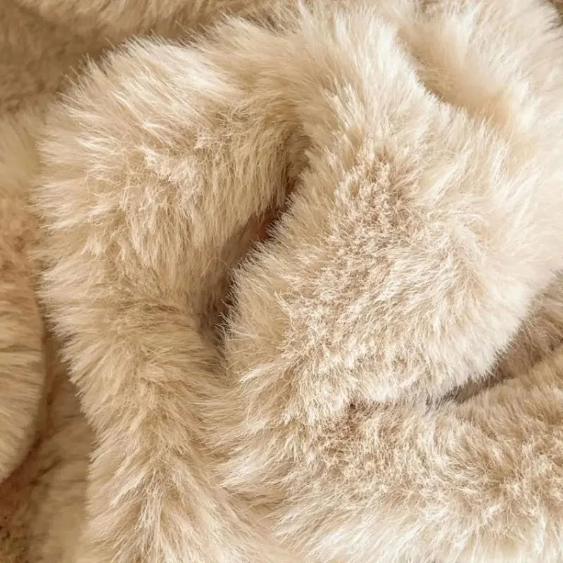 Extreme close-up of the long, soft fibers of the Warm Beige faux fur-like fleece. - RoomDen