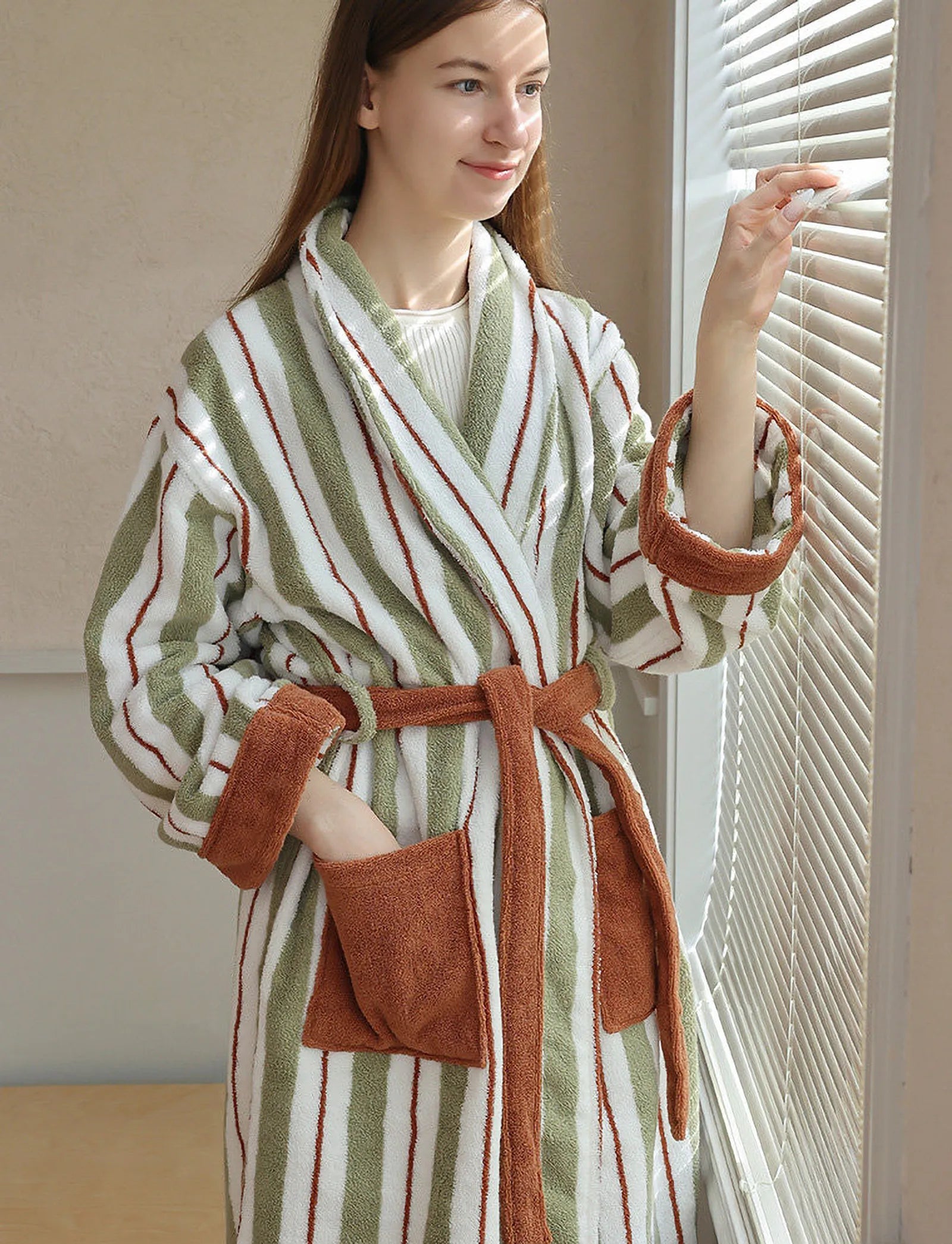 Front view of the RoomDen striped robe showing the shawl collar, belt, and large pockets.