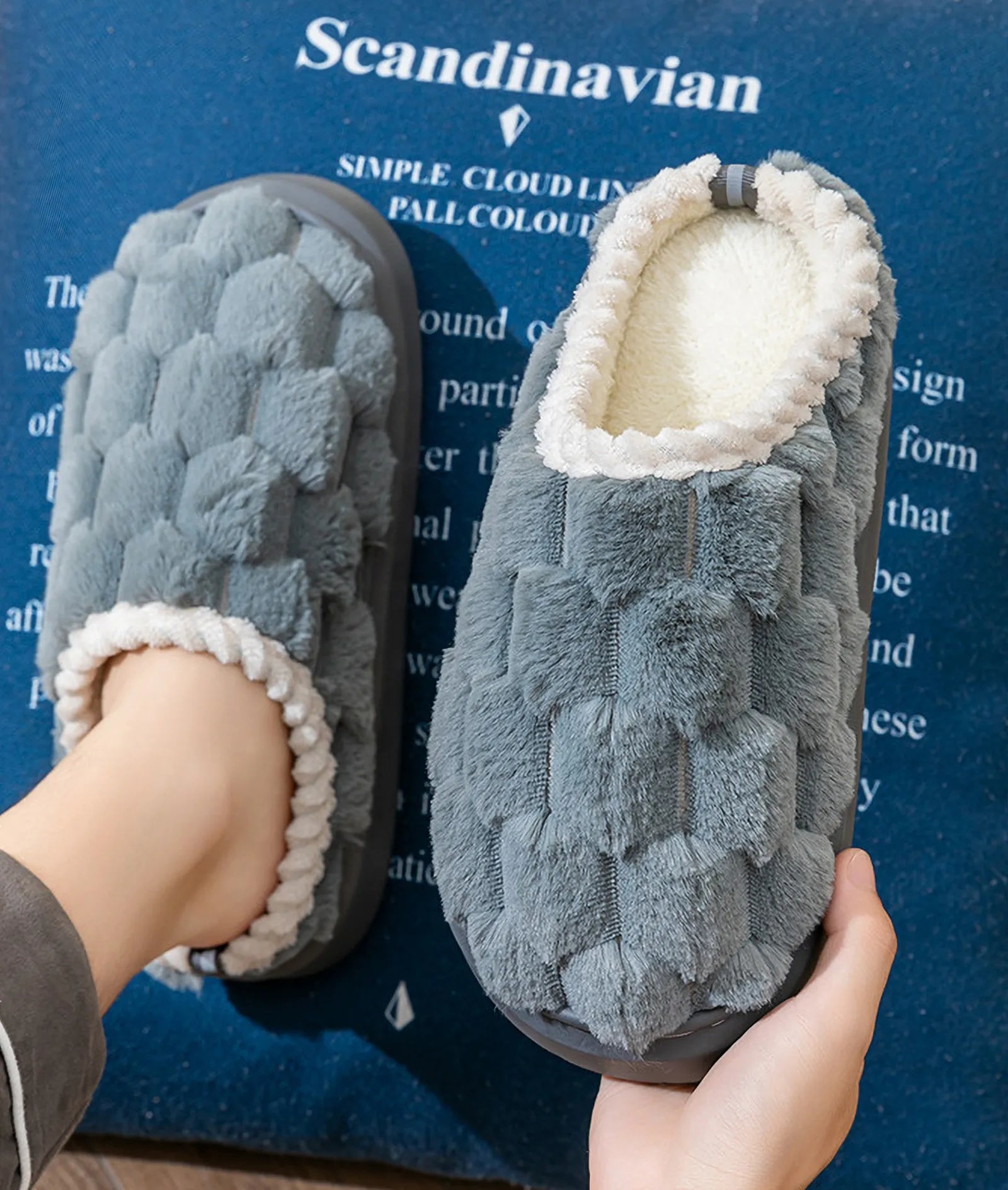 Woman wearing Steel Blue Plush Slides resting on blue cushion lifestyle shot - RoomDen
