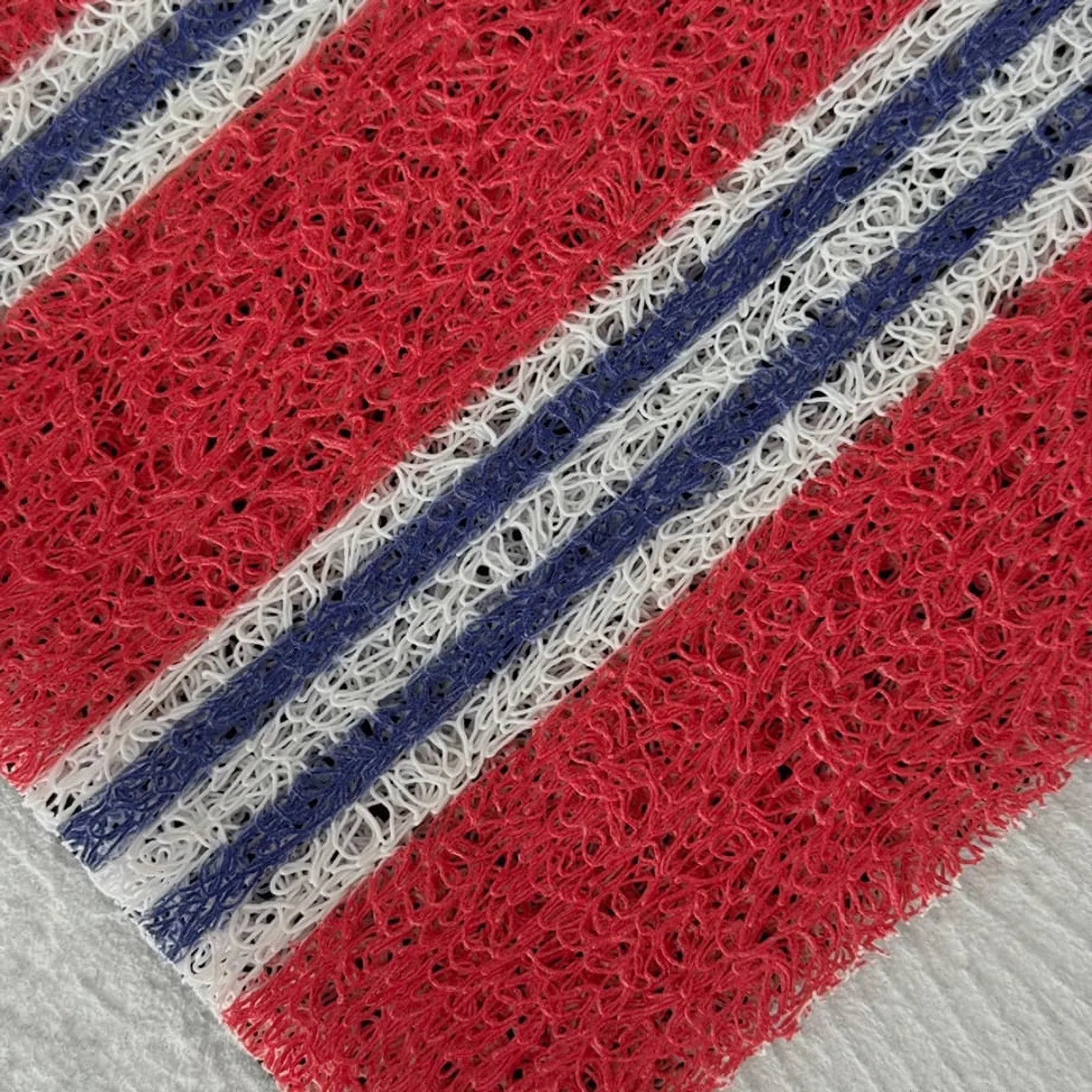 Macro view of looped vinyl texture Red and Blue - RoomDen