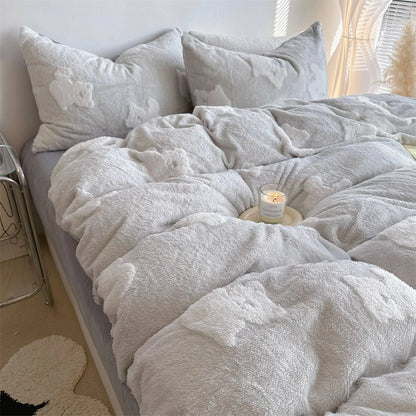A cozy, inviting shot of the light grey teddy bear flannel fleece bedding set, looking incredibly soft. - RoomDen
