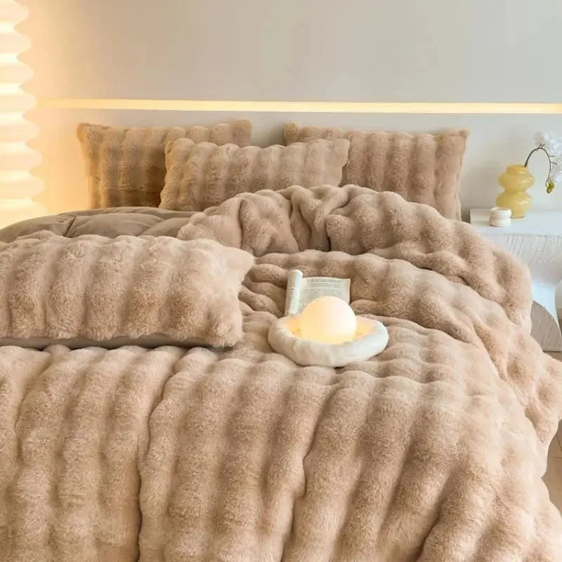 Full bed view of the Warm Beige flannel fleece bedding set in a warmly lit room. - RoomDen