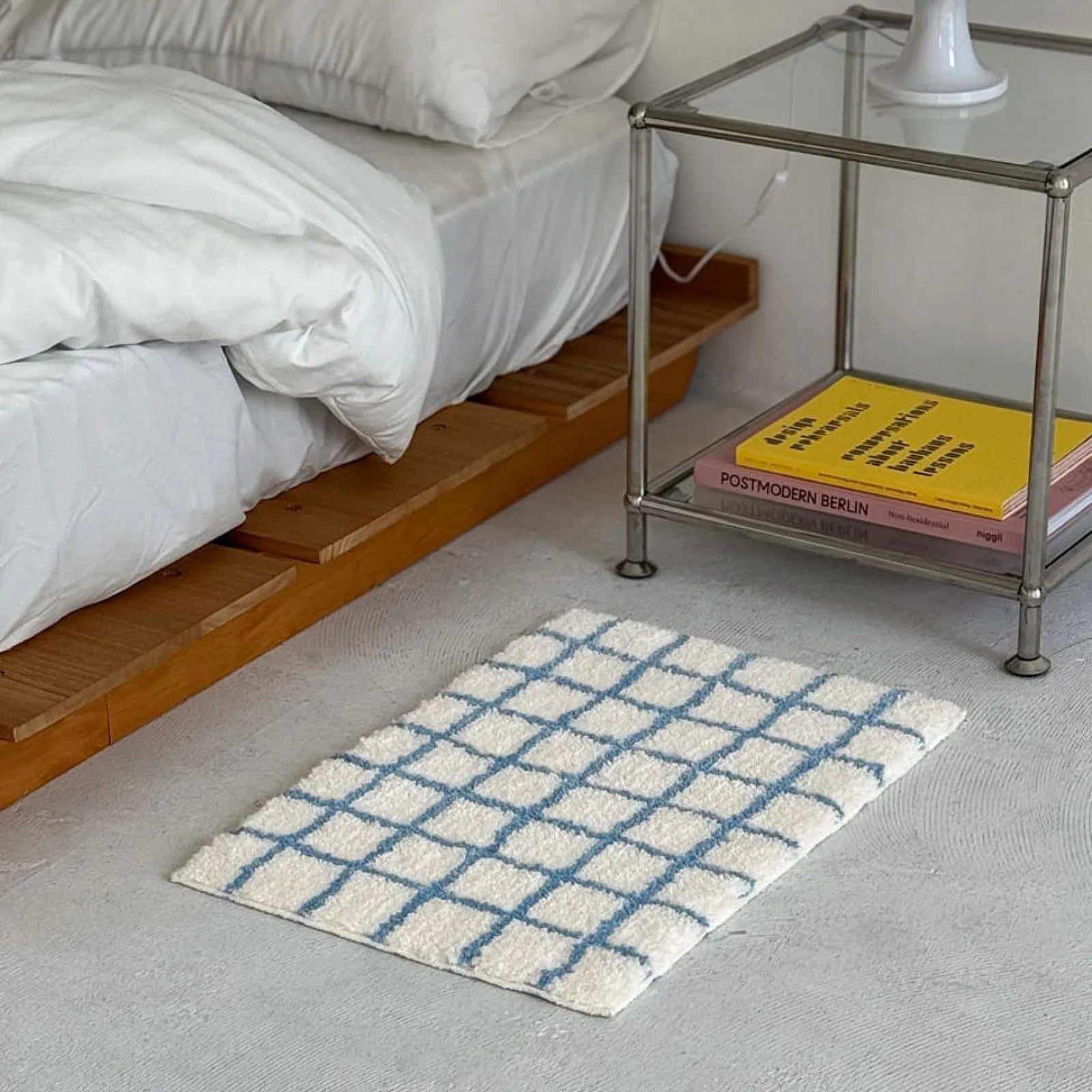 Angled Perspective of Plush Polyester Area Rug with Blue Grid Lines - RoomDen