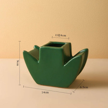 The Forest Green Leaf Base of the Daisy Bloom Ceramic Vase with dimension callouts: 9cm height, 14cm width. - RoomDen