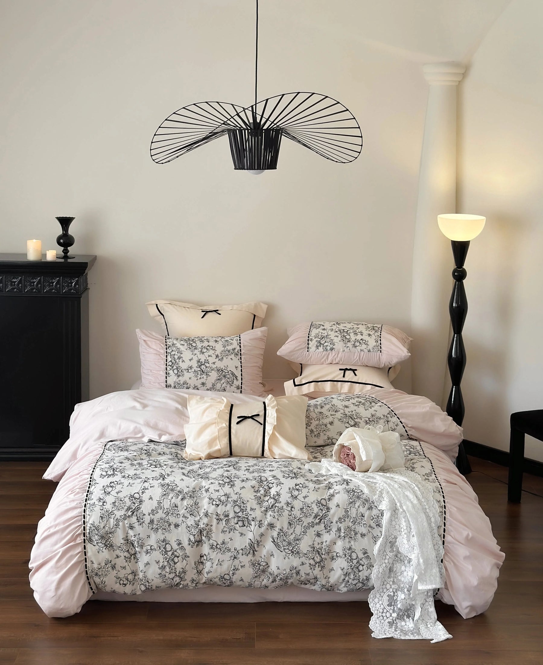 Full bedroom view of the Ruffled Botanical Toile Bedding Set in the Pink Toile color variant. - RoomDen