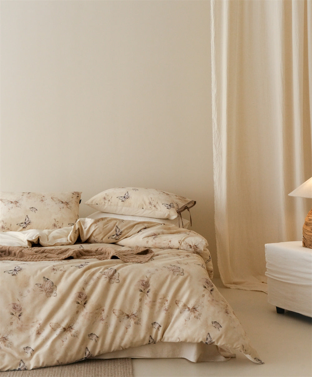 Stillgarden Drifting Butterfly Cotton Linen Bedding Set – Front view of pale butterfly bedding and taupe ties - Roomden