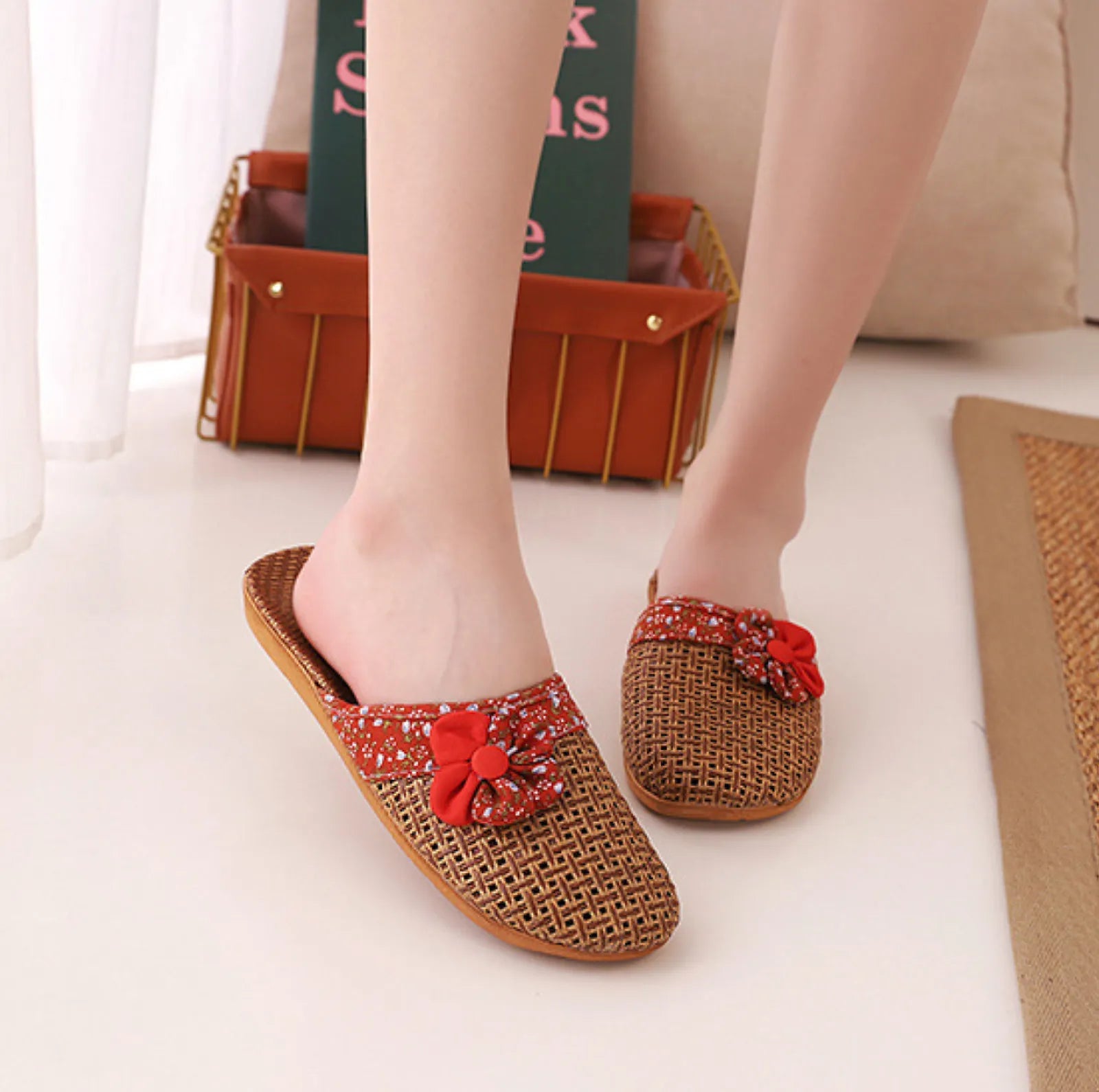 Front view of Red Floral Woven Slippers on model feet - RoomDen