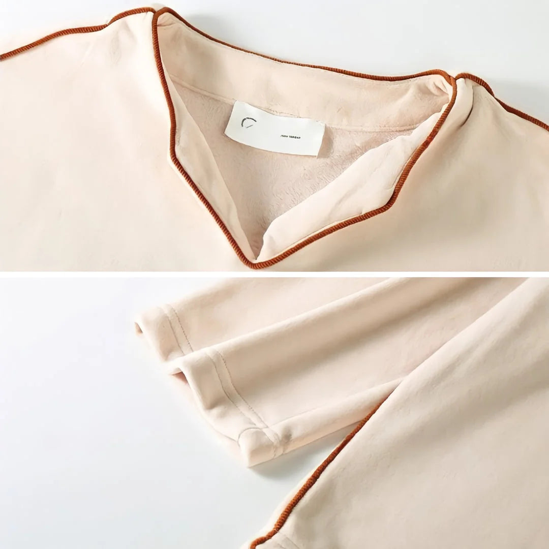 Close-up collage showing the contrast piping on the V-neckline and the plush fabric of the sleeve cuff. - RoomDen