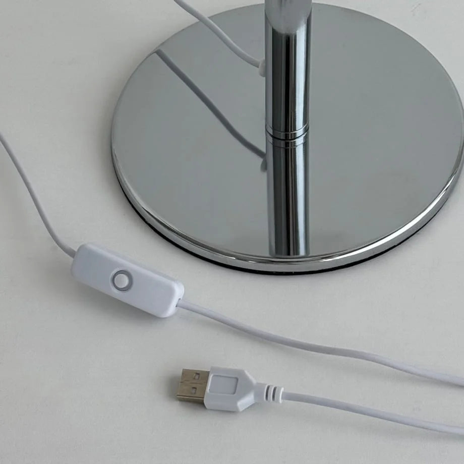 Detail of the lamp's white USB cable and in-line power switch - RoomDen.