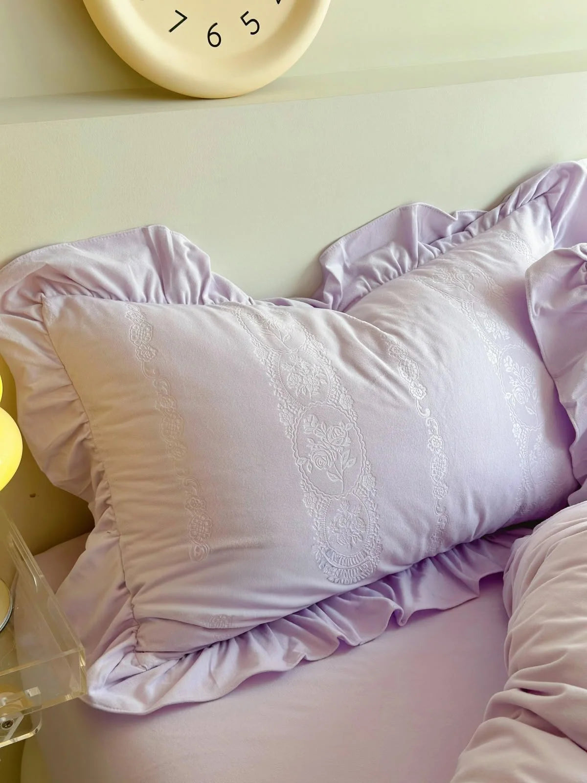 Detail of the delicate ruffled trim on the Lavender Jacquard Velvet pillowcase. - RoomDen