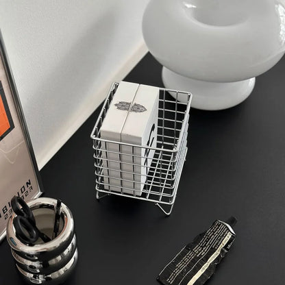 Top-down view of the silver metal grid organizer, showing its square shape and contents - RoomDen.